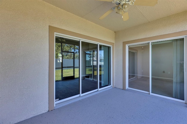 view of patio with a ceiling fan