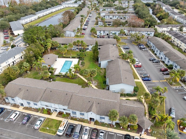 aerial view with a residential view and a water view