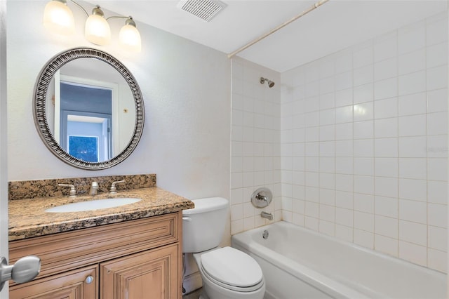 full bath featuring visible vents, vanity, toilet, and shower / bathtub combination