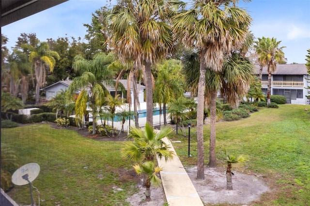 view of yard with an outdoor pool