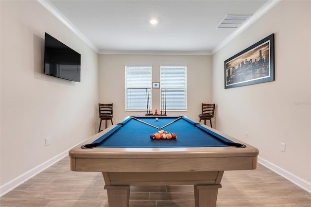 rec room with pool table, crown molding, and baseboards