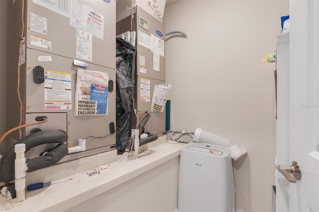 1472 Rushing Rapids Way, Winter Springs, FL 32708 - utility room featuring heating unit