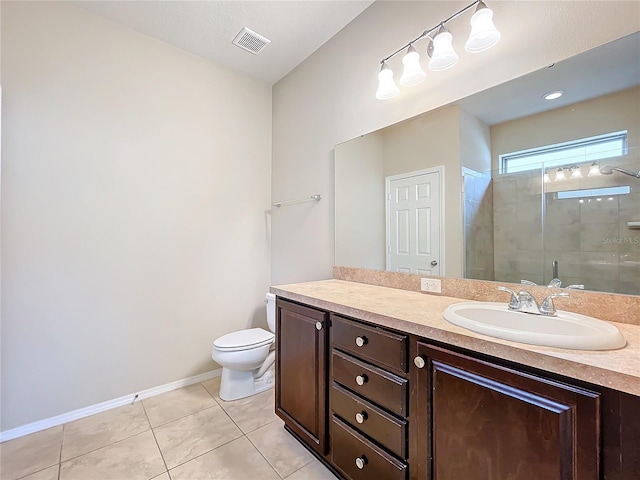 bathroom featuring a stall shower, visible vents, toilet, tile patterned flooring, and vanity