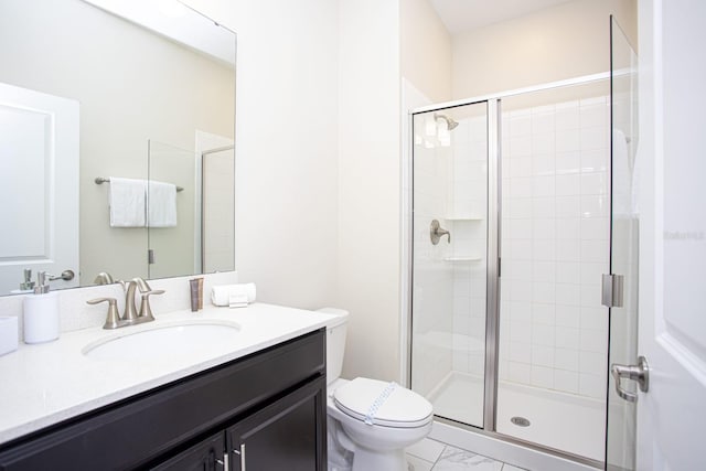 bathroom featuring marble finish floor, toilet, a shower stall, and vanity