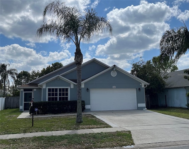 ranch-style home with stucco siding, driveway, a front lawn, and an attached garage