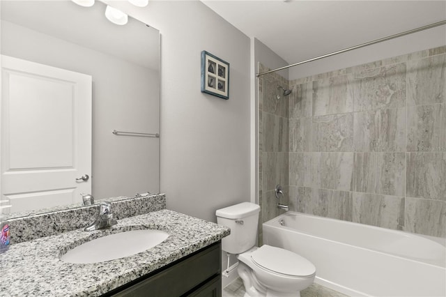 bathroom featuring tub / shower combination, vanity, and toilet