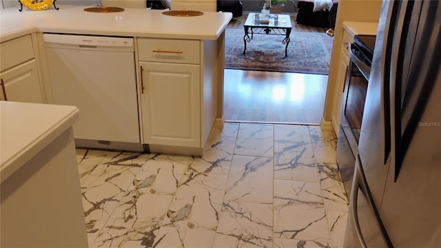 12209 Putter Green Ct, New Port Richey, FL 34654 - kitchen with dishwasher, light marble finish floors, light countertops, and refrigerator