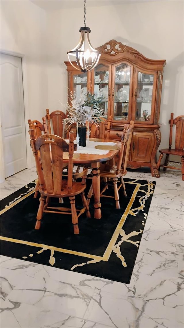 12209 Putter Green Ct, New Port Richey, FL 34654 - dining space featuring light marble finish floors