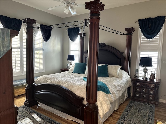 12209 Putter Green Ct, New Port Richey, FL 34654 - bedroom featuring wood finished floors