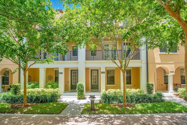 view of front of home featuring stucco siding