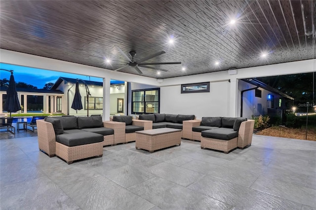 view of patio / terrace with ceiling fan and an outdoor hangout area