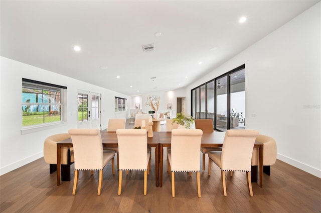 dining area featuring recessed lighting, visible vents, dark wood finished floors, and french doors