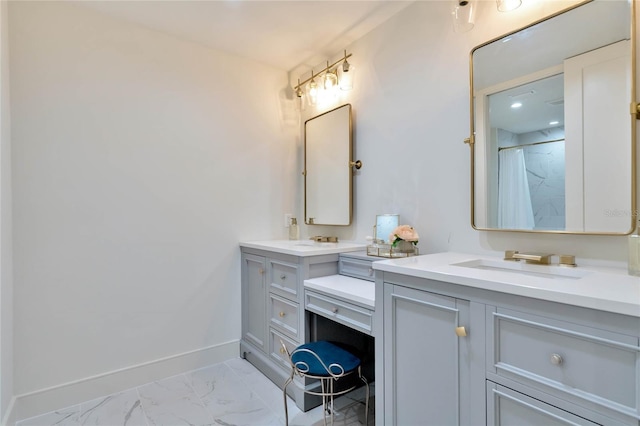 full bath with marble finish floor, vanity, baseboards, and a shower with shower curtain