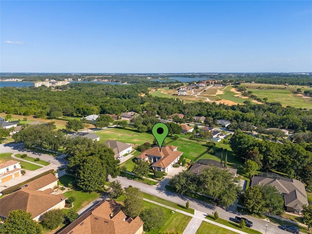 aerial view with a residential view and a water view