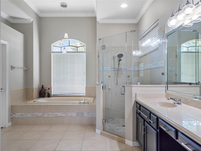 full bath featuring ornamental molding, a wealth of natural light, a garden tub, and a stall shower