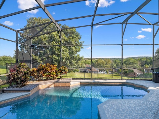 view of pool featuring a lanai, a fenced in pool, and fence