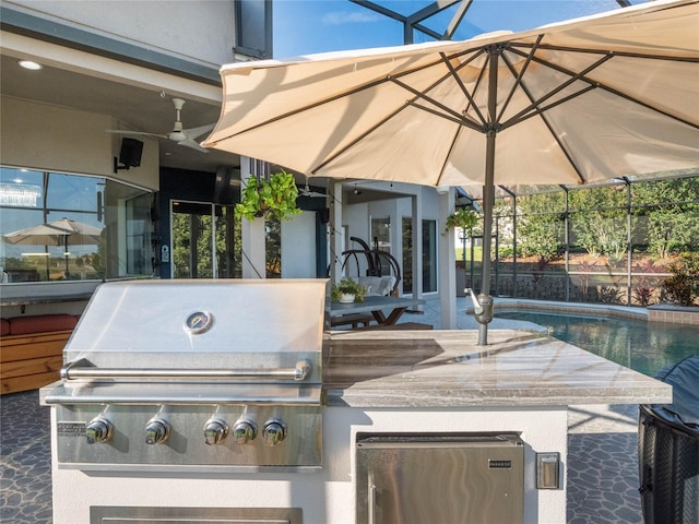 view of patio featuring ceiling fan, grilling area, a lanai, and an outdoor pool