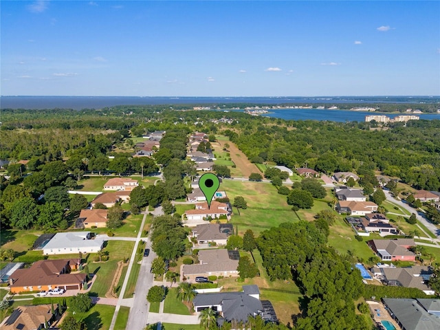 drone / aerial view with a water view