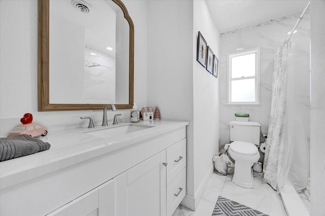 bathroom featuring toilet, vanity, visible vents, marble finish floor, and a stall shower