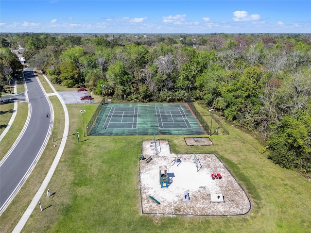 aerial view featuring a wooded view