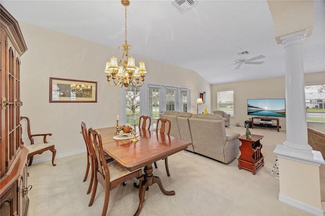 dining area featuring a healthy amount of sunlight, light colored carpet, visible vents, and ornate columns