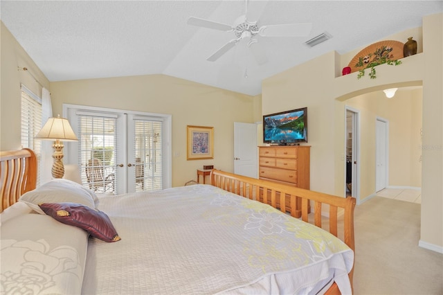 bedroom featuring visible vents, light colored carpet, access to outside, vaulted ceiling, and french doors