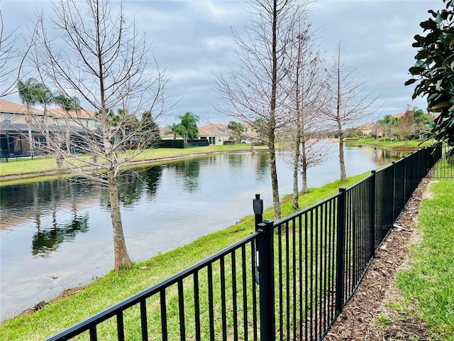 property view of water with fence