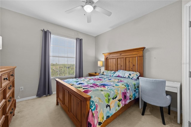 1357 Venezia Ct Unit 402, Davenport, FL 33896 - bedroom featuring light carpet, ceiling fan, and baseboards