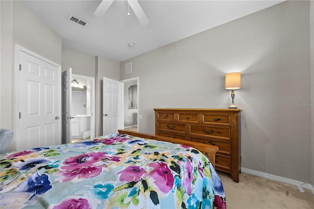 1357 Venezia Ct Unit 402, Davenport, FL 33896 - bedroom with light carpet, baseboards, visible vents, and ceiling fan
