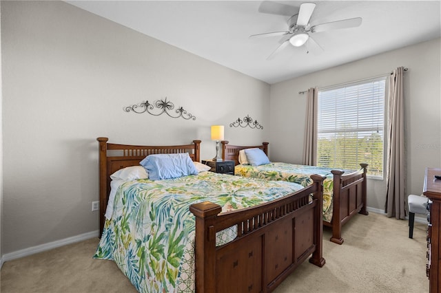 1357 Venezia Ct Unit 402, Davenport, FL 33896 - bedroom with a ceiling fan, light carpet, and baseboards