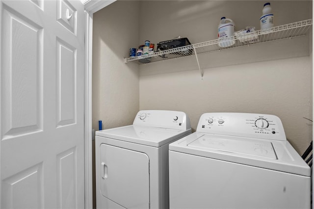 1357 Venezia Ct Unit 402, Davenport, FL 33896 - washroom featuring washer and dryer and laundry area