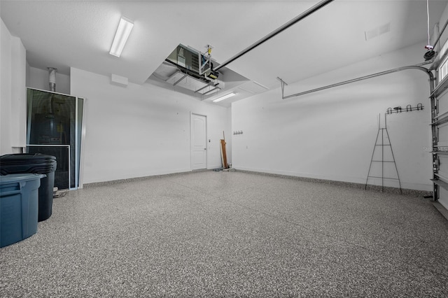 garage with baseboards