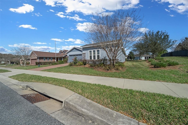 bungalow-style house with a front yard