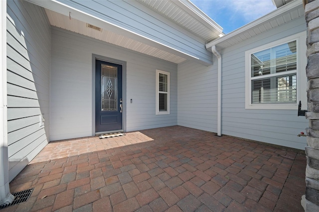 view of patio featuring visible vents