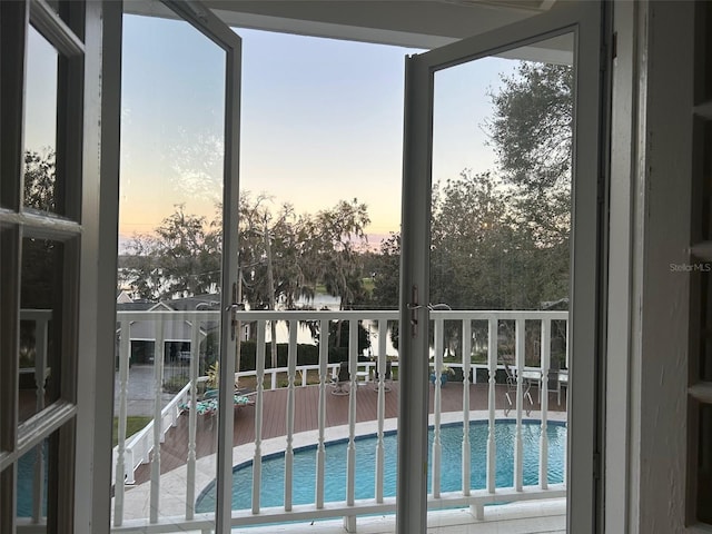 exterior space with a fenced in pool