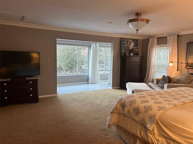 carpeted bedroom featuring ornamental molding, attic access, and baseboards