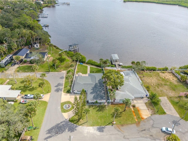 birds eye view of property featuring a water view