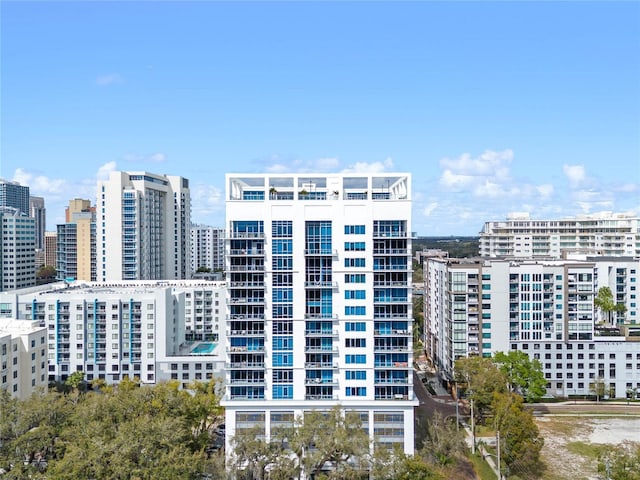 view of property with a city view