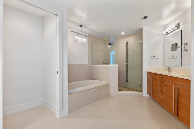 full bathroom featuring vanity, tile patterned flooring, a shower stall, and a bath