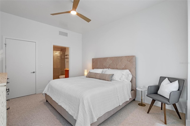 bedroom with light carpet, ceiling fan, connected bathroom, and visible vents