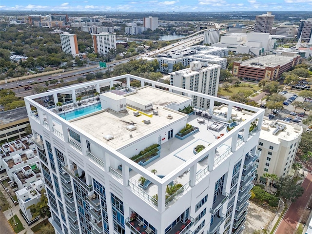 drone / aerial view featuring a city view