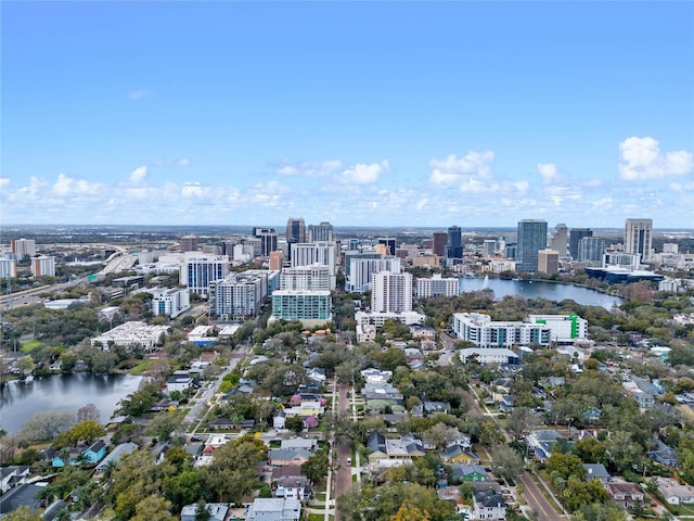 drone / aerial view with a water view and a view of city