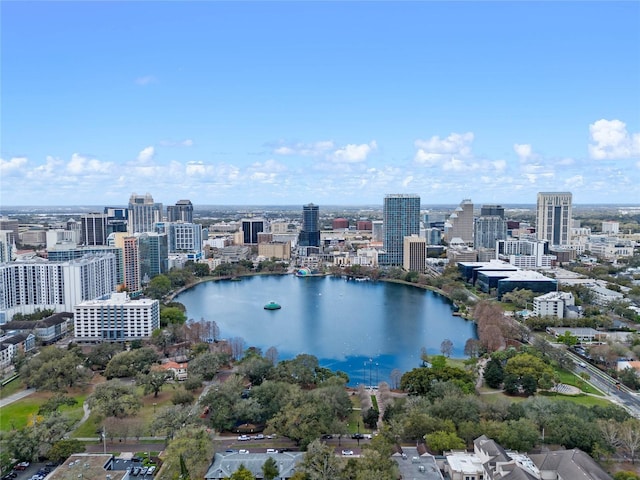 aerial view featuring a view of city and a water view