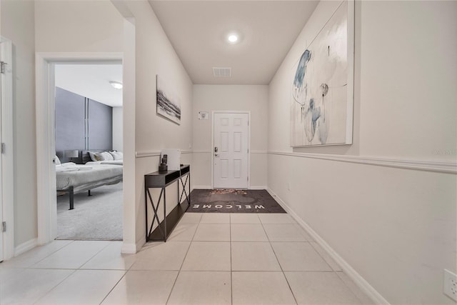 4149 Lana Ave, Davenport, FL 33897 - hall featuring light tile patterned floors and baseboards