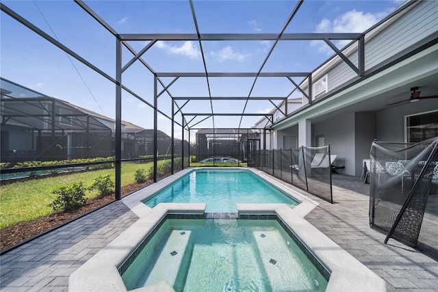 4149 Lana Ave, Davenport, FL 33897 - view of pool featuring a pool with connected hot tub, a patio, ceiling fan, and a yard