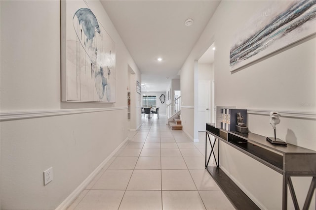 4149 Lana Ave, Davenport, FL 33897 - hall with light tile patterned flooring, stairs, recessed lighting, and baseboards