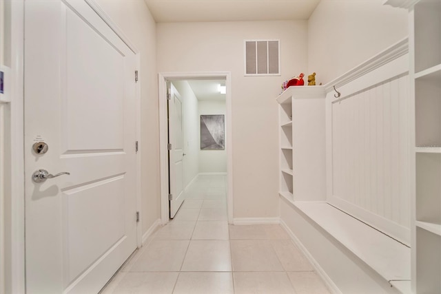 4149 Lana Ave, Davenport, FL 33897 - mudroom with light tile patterned floors and baseboards