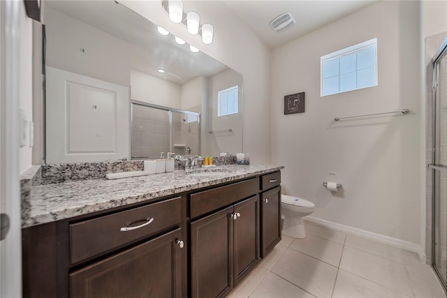 4149 Lana Ave, Davenport, FL 33897 - full bathroom featuring toilet, baseboards, vanity, a shower stall, and tile patterned flooring