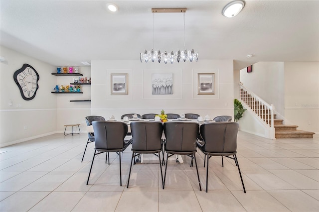 4149 Lana Ave, Davenport, FL 33897 - dining space with light tile patterned flooring and stairs