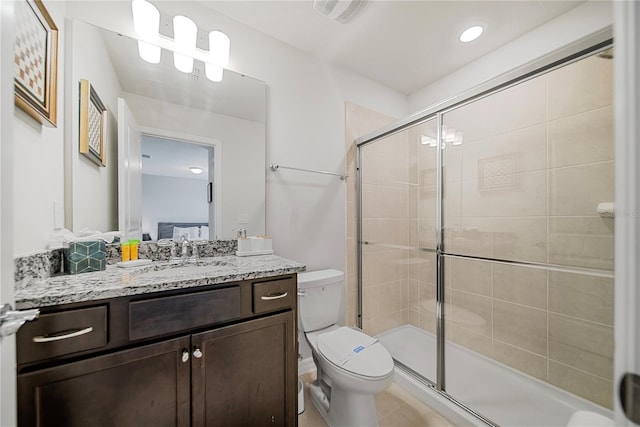 4149 Lana Ave, Davenport, FL 33897 - full bath with toilet, vanity, a stall shower, and tile patterned floors
